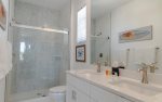 Ensuite master bathroom with dual vanity and beautiful walk-in shower.